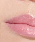 CHANEL Rouge Coco Baume Shine Hydrating Tinted Lip Balm 3g - 772 Sparkling Pink - application visual a
